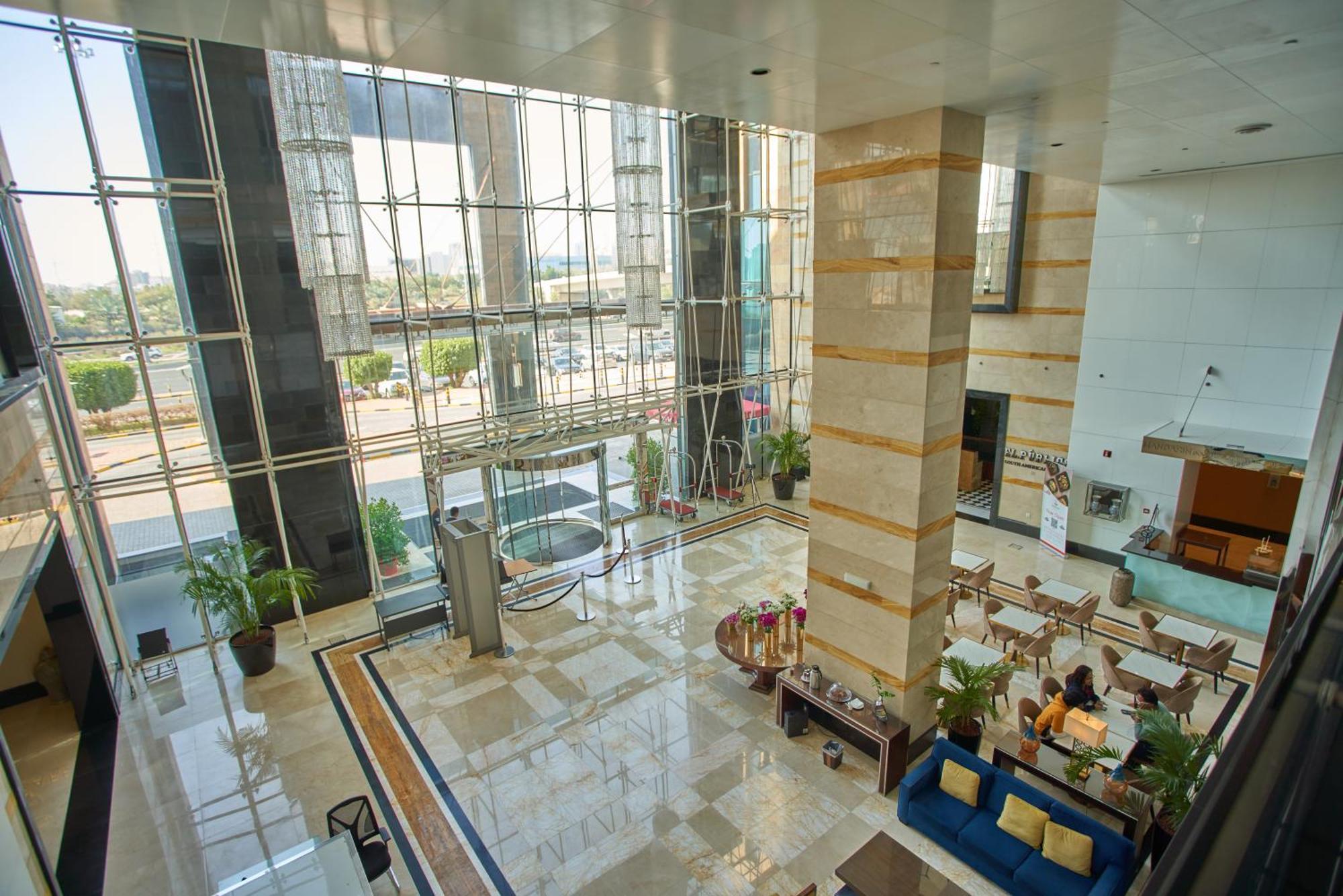 فندق ومركز مؤتمرات ميلينيوم الكويت المظهر الخارجي الصورة Lobby of the hotel