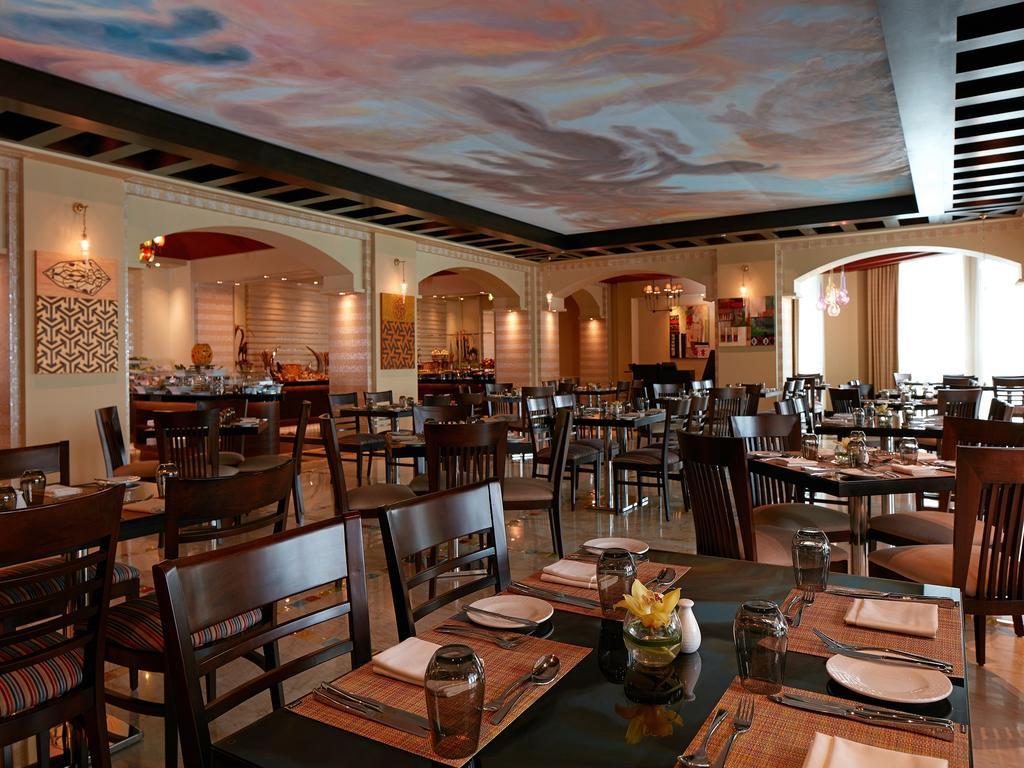 فندق ومركز مؤتمرات ميلينيوم الكويت المظهر الخارجي الصورة The interior of the restaurant