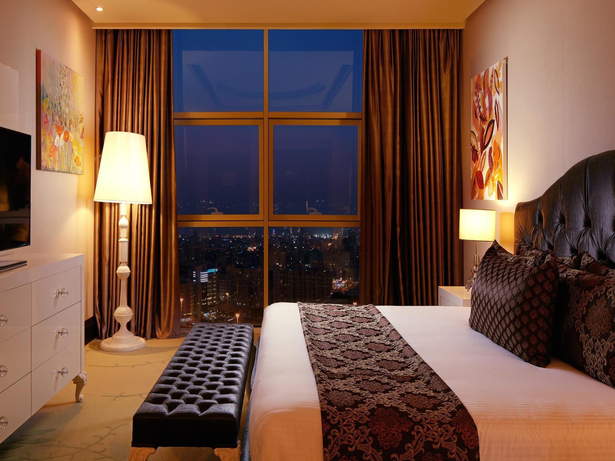 فندق ومركز مؤتمرات ميلينيوم الكويت المظهر الخارجي الصورة A bedroom at the hotel
